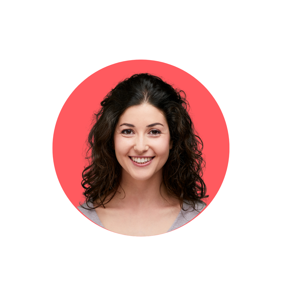 smiling woman with black curly hair wearing a grey top, the background is red