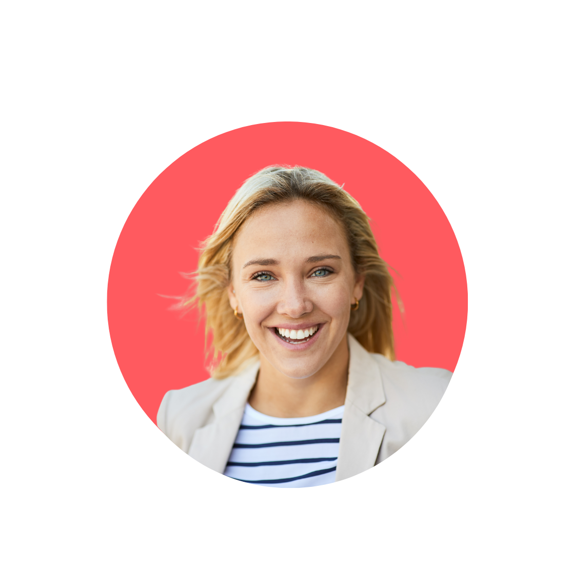 smiling woman with short blonde hair wearing a striped top and a cream blazer, and a red background